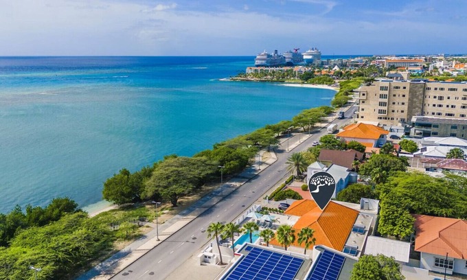 Oranjestad Villa | LUX 10BR/10BA Pool Beach Front Villa Playa by Bocobay