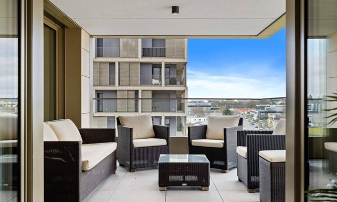 Gasperich Apartamento | Lux City Escape: 2BR Apt with Balcony & Workspace