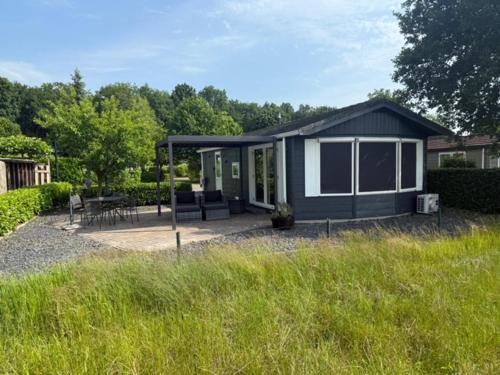 Papenvoort Chalet De Esquí | Luxe chalet met uniek vrij uitzicht op rustig park in Papenvoort DRENTHE