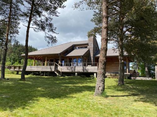 Le Chambon-sur-Lignon Casa | Luxe et détente : Lodge avec SPA privatif et accès piscine, golf, et aire de jeux. - FR-1-582-39