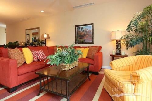 Coco Casa | Luxe! Impressively designed 2nd-floor unit in Coco done in red and orange hues