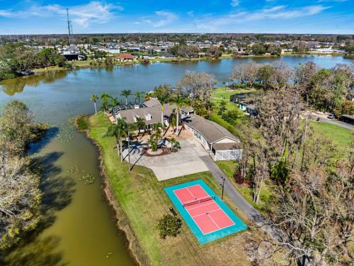 Westchase Casa | Luxe Waterfront Hideaway w Pool Pirate Ship Dock