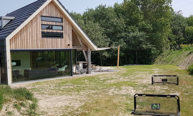 Ouddorp Casa | Villa de nueva construcción para 8 personas con sauna justo en la playa en Ouddorp