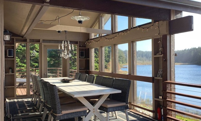 Langlois Casa | Luxurious Getaway on the Lake with hot tub, pool table, boat dock, covered porch