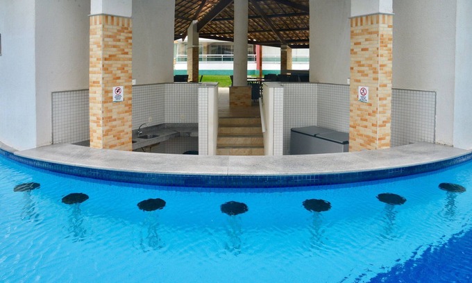 Porto das Dunas Condominio | Lujo con 2 habitaciones, salón, balcón, jacuzzi y barbacoa
