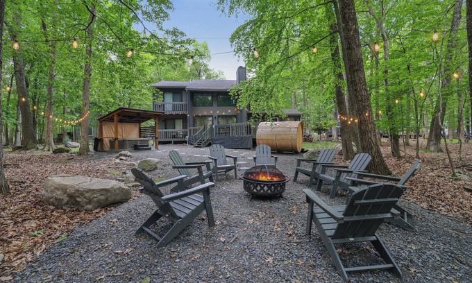 East Stroudsburg Casa | Luxurious Poconos Retreat~Hot Tub, Sauna, Games, Fire Pit, Pets Welcome!
