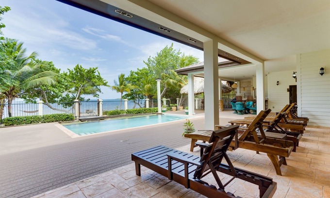 Placencia Villa | Luxury 4BR Beachfront Home-Pool & Spa-Like Bath