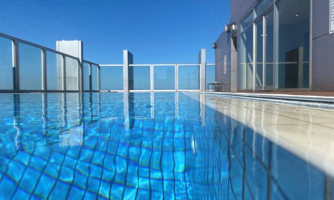 East Melbourne Apartamento | Luxury Accommodation with roof top pool.