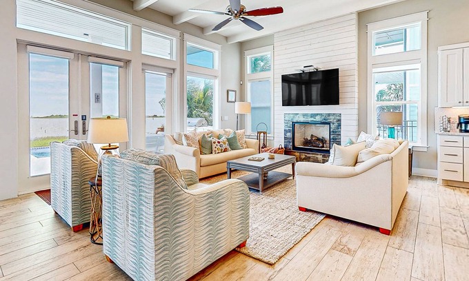 Rockport Casa | Luxury bayfront home with plunge pool, outdoor kitchen, docks, kayaks & SUPs
