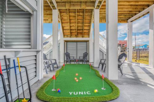 Crystal Beach Casa | Luxury Beach House Glow in dark golf Game Room