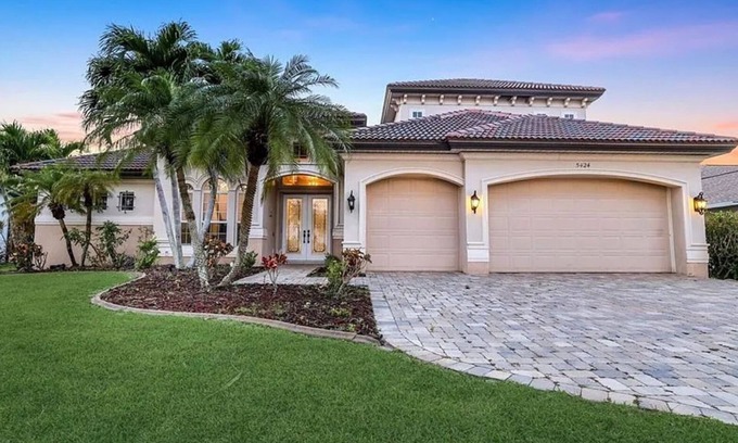 Cape Harbour Casa | Luxury Cape Harbour Canal 4 Bedroom Pool Home on the Water Minutes to Night Life