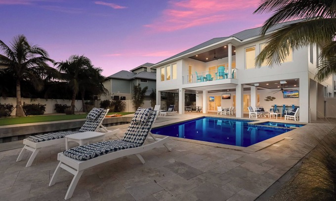 Anna Maria Casa | Luxury Canalfront Retreat with Dock, Pool, Spa and Game Room
