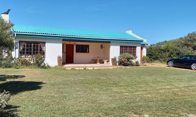 Betty's Bay Cabaña | Casa de lujo con hermosas vistas a un lago en una reserva natural cerca del mar