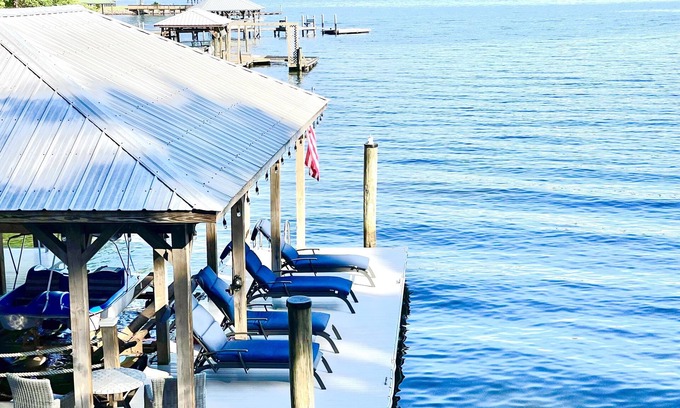 Terrell Casa | Luxury lakefront home with a covered private dock & large game room