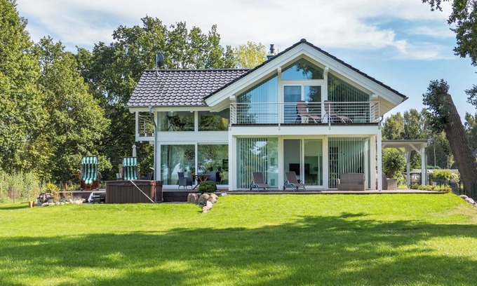 Bodstedt Casa | Luxury & nature combined * Holiday home with a view of the water and nature reserve