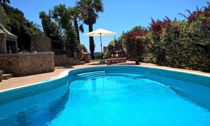 San Stefano Casa | Villa de lujo junto al mar: un conjunto joya en la bahía de Cala Caterina, Villasimius