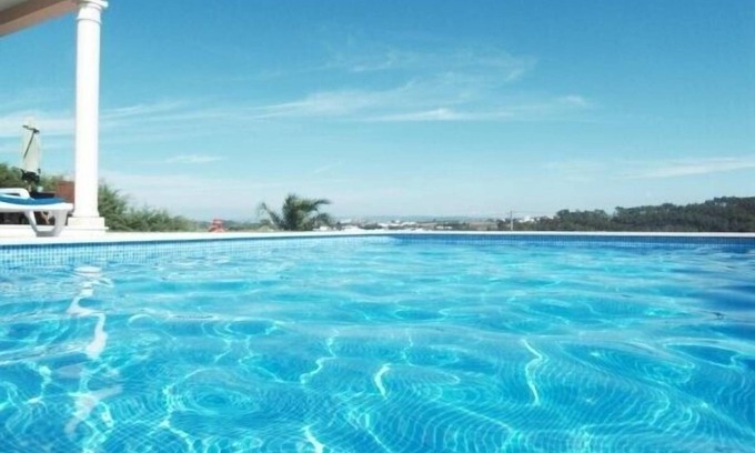 A dos Negros Villa | Villa de lujo con piscina climatizada privada, vistas panorámicas a las montañas con conexión Wi-Fi gratuita