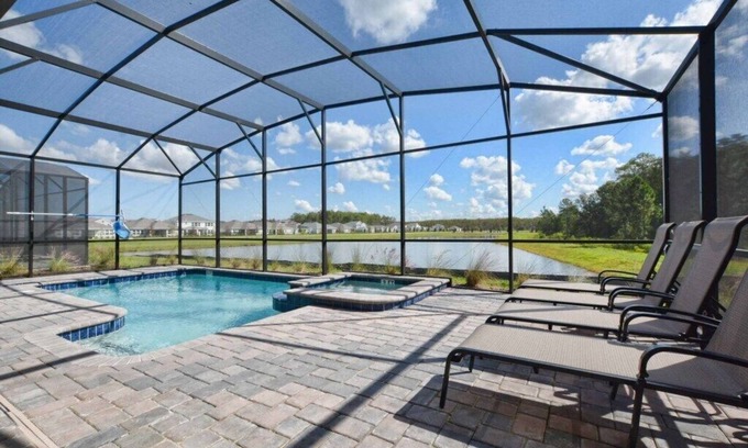 Campbell Casa | HERMOSA NUEVA FRENTE AL AGUA DE 9 DORMITORIOS !! ¡LA MEJOR UBICACIÓN PARA DISNEY! ¡JACUZZI, REC ROOM, HARRY POTTER Y MICKEY ROOMS!