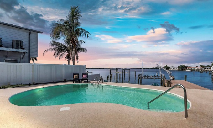 St. Petersburg - Clearwater Casa | Luxury Waterfront Farmhouse Retreat w/Saltwater Pool, Dock & Tiki Bar