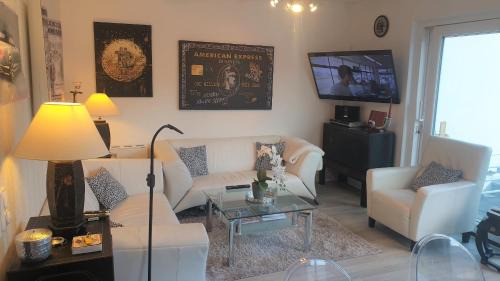 Travemuende Casa | Luxusferienhaus, stylisch, modern, schick mit Garten, Kamin und 2 Schlafzimmern, 3 WC