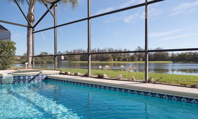 Lake Berkley Villa | DISEÑADOR MODERNO CON VISTA AL LAGO VILLA 4BD / SPA, LAKE BERKLEY RESORT cerca de DISNEY