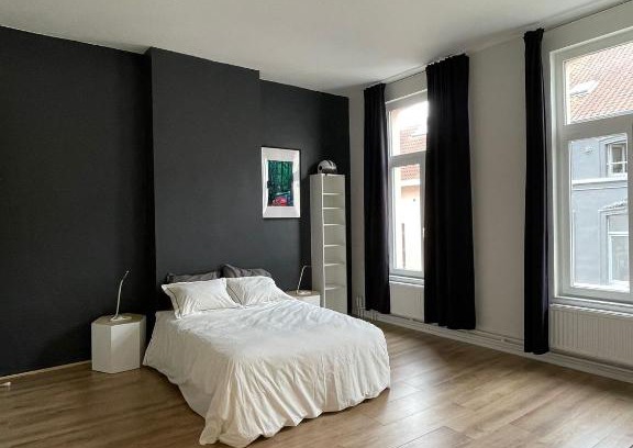 Postel Apartamento | Magnifique duplex situé place Flagey