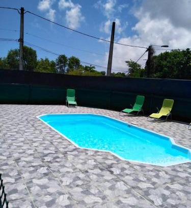 Le Moule Casa | Maison charmante proche de la plage au Moule avec piscine