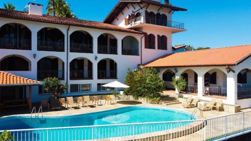 Tenorio Casa | Mansão com área gourmet e vista para a praia