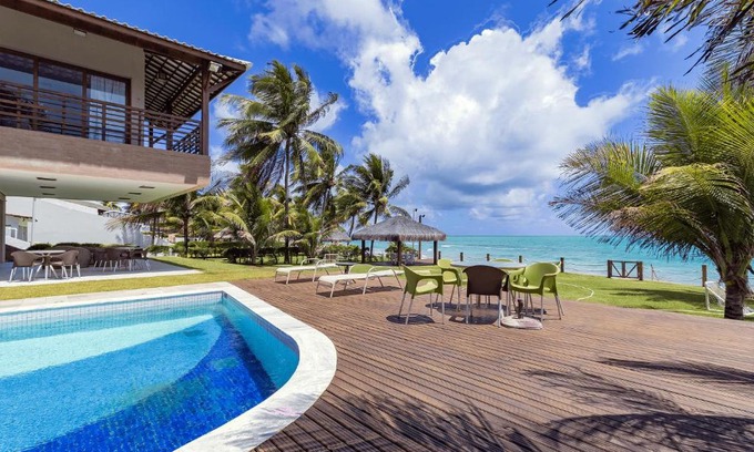 Tamandare Casa | Mansão Pé na Areia em Carneiros por Carpediem
