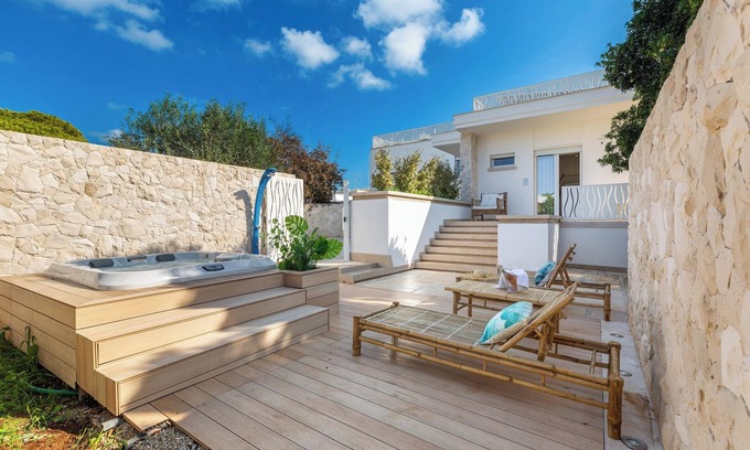 Torre Lapillo Casa | Marelux Suite premium con Jacuzzi