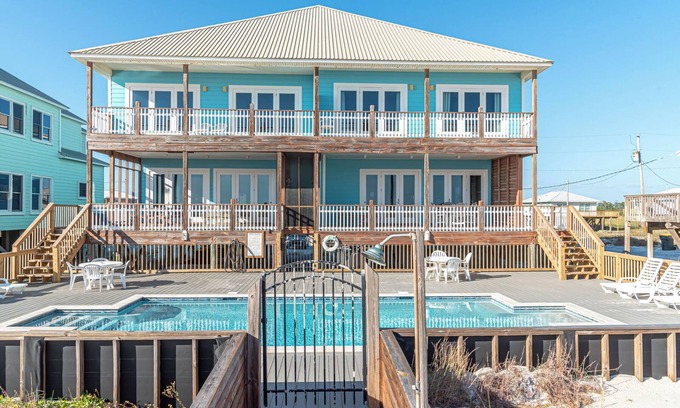 Southpointe Casa | Margarittaville East. Professionally decorated, Gulf front 6 BR 4.5 BA unit with a pool