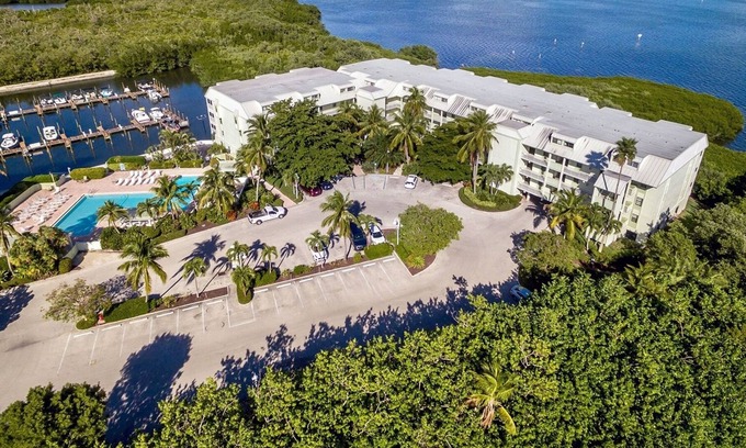 Captiva Casa | Marina views, heated pool, hot tub, short walk to the beach