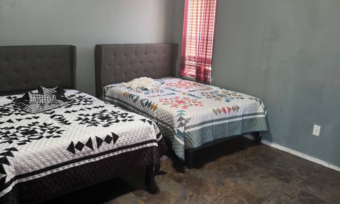 Greenacres Apartamento | Master bedroom with private restroom and private entrance. Two full beds+ futon