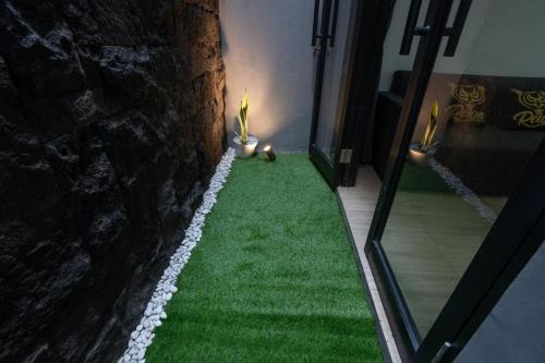 Renon Apartamento | Mezzanine Luxury Smart Room - Sanur