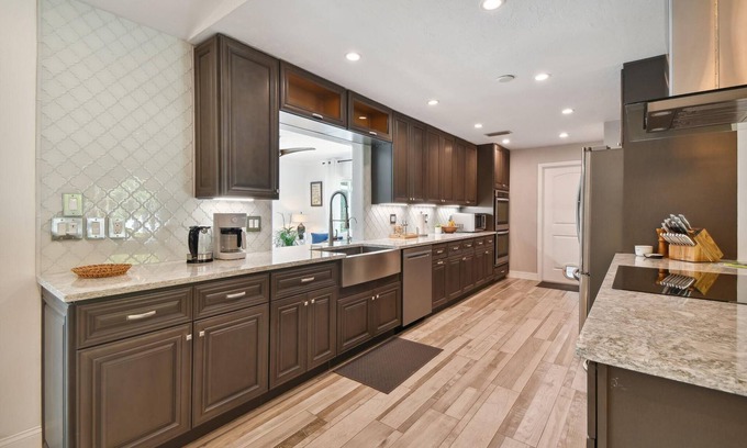 Desoto Lakes Casa | Mid-Century Modern pool home 3 bed, 2 bath home, walkways in the private garden