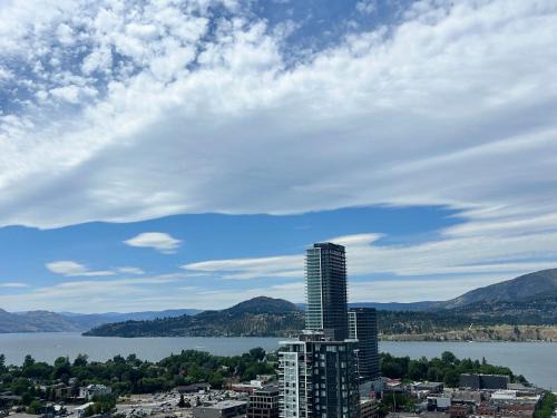 Downtown Kelowna Casa | Million-Dollar View 1 bedroom with private bathroom in a shared 2 bed apartment with access to 34th floor lounge in Downtown Kelowna