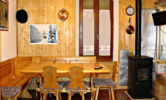 Comeglians Apartamento | Mini apartamento con terraza panorámica.