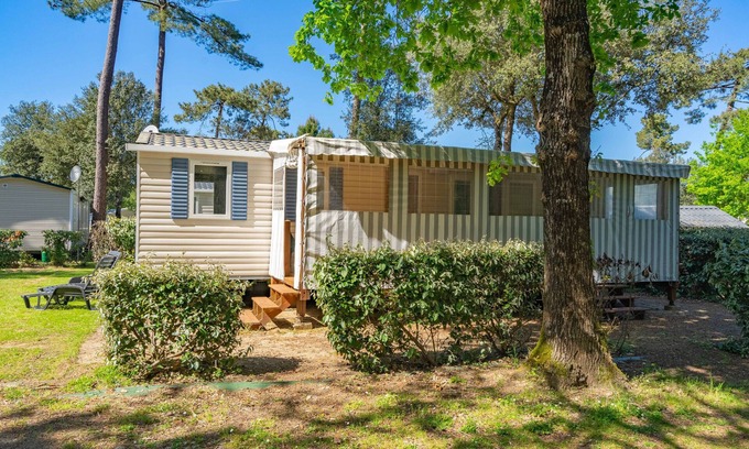 Ronce-les-Bains Alquiler De RV | Mobil Home 'Mh 122 Ronce Les Bains' con piscina compartida, terraza y aire acondicionado