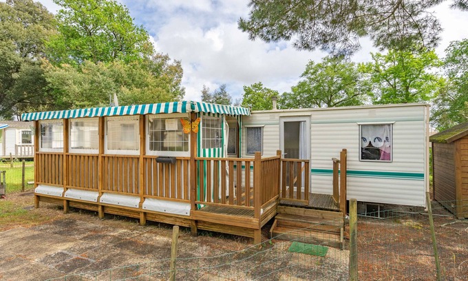 La Tremblade Alquiler De RV | Mobilhome 'Mobilhome Mh343' con piscina compartida, terraza privada y jardín privado