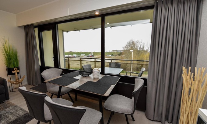 Duhnen Apartamento | Modern 1-room lake view apartment on the 2nd floor with balcony