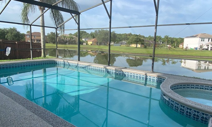Crescent Lakes Villa | Modern 5 bedroom villa with private pool/ lake view / 30 mins from Disney