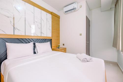 Depok Apartamento | Modern and Comfort 2BR Transpark Cibubur Apartment By Travelio
