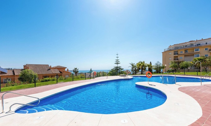 La Cala de Mijas Apartamento | Moderno apartamento 'In Jardin Botanico' con vistas al mar, piscina, Wi-Fi, jardín y terraza.