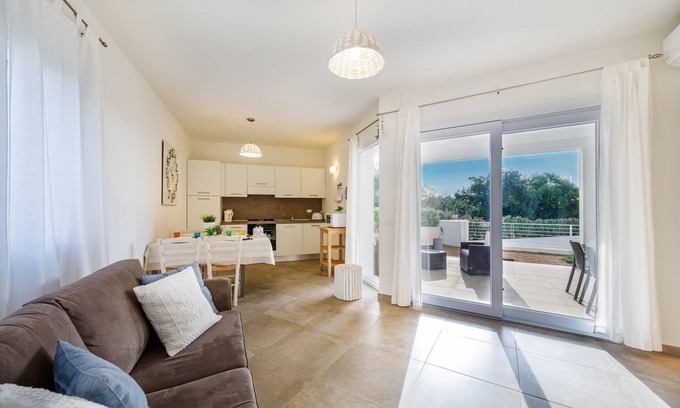 Monte Petrosu Apartamento | moderno apartamento a 5 min del mar con aire acondicionado, piscina, wi-fi