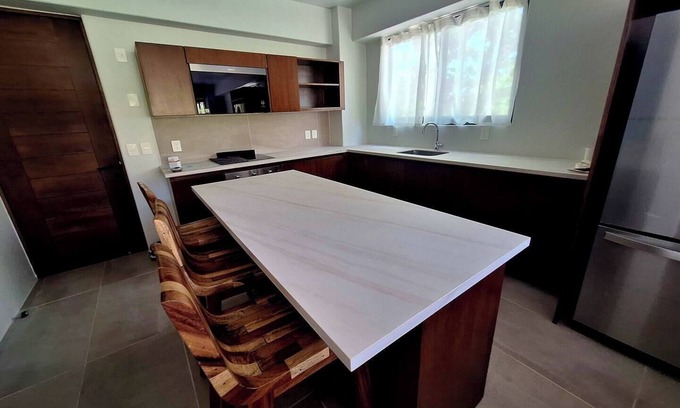 P Chahue Apartamento | Modern Apt with Pool - 5 Min walk to Chahue Beach