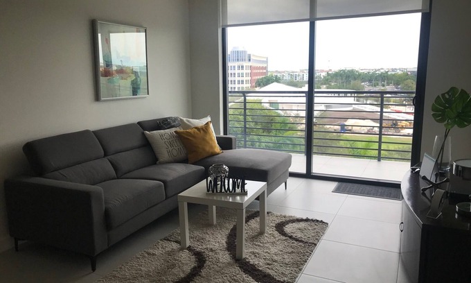 Doral Condominio | Modern building, centrally-located condo,2 bedrooms/2 bathrooms, parking space.
