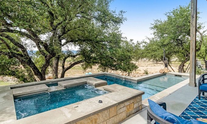 Burnet Casa | Modern charmer with gleaming lake views, pool, fireplace, & grill - dog-friendly