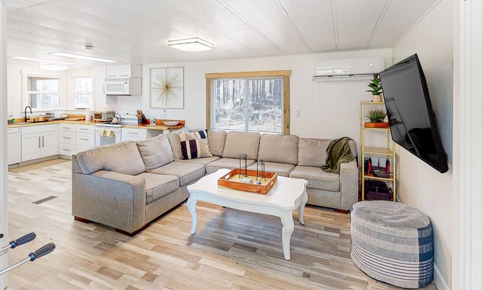 Blue River Cabina | Modern dog-friendly cabin with private deck, foosball, grill, AC, & W/D