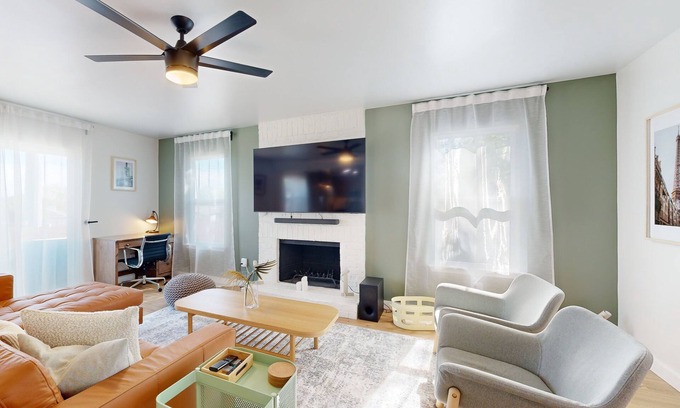 Scofield Farms Casa | Modern home with an enclosed backyard with wood fire pit in North Austin