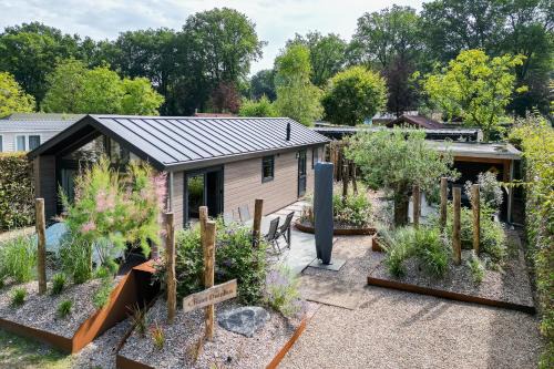 Epe Casa | Modern ingericht chalet op groen park op de Veluwe